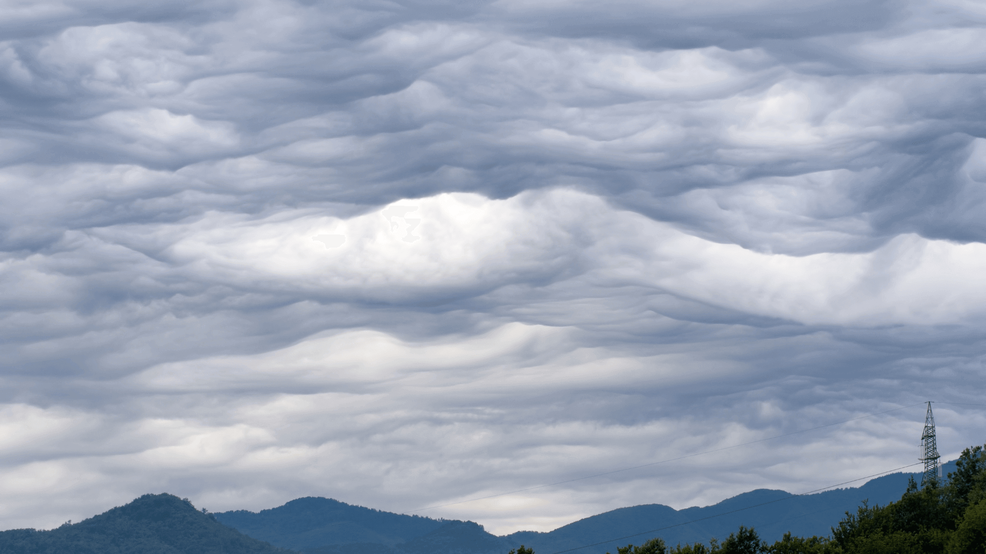 Asperitas clouds form rippling waves in the sky