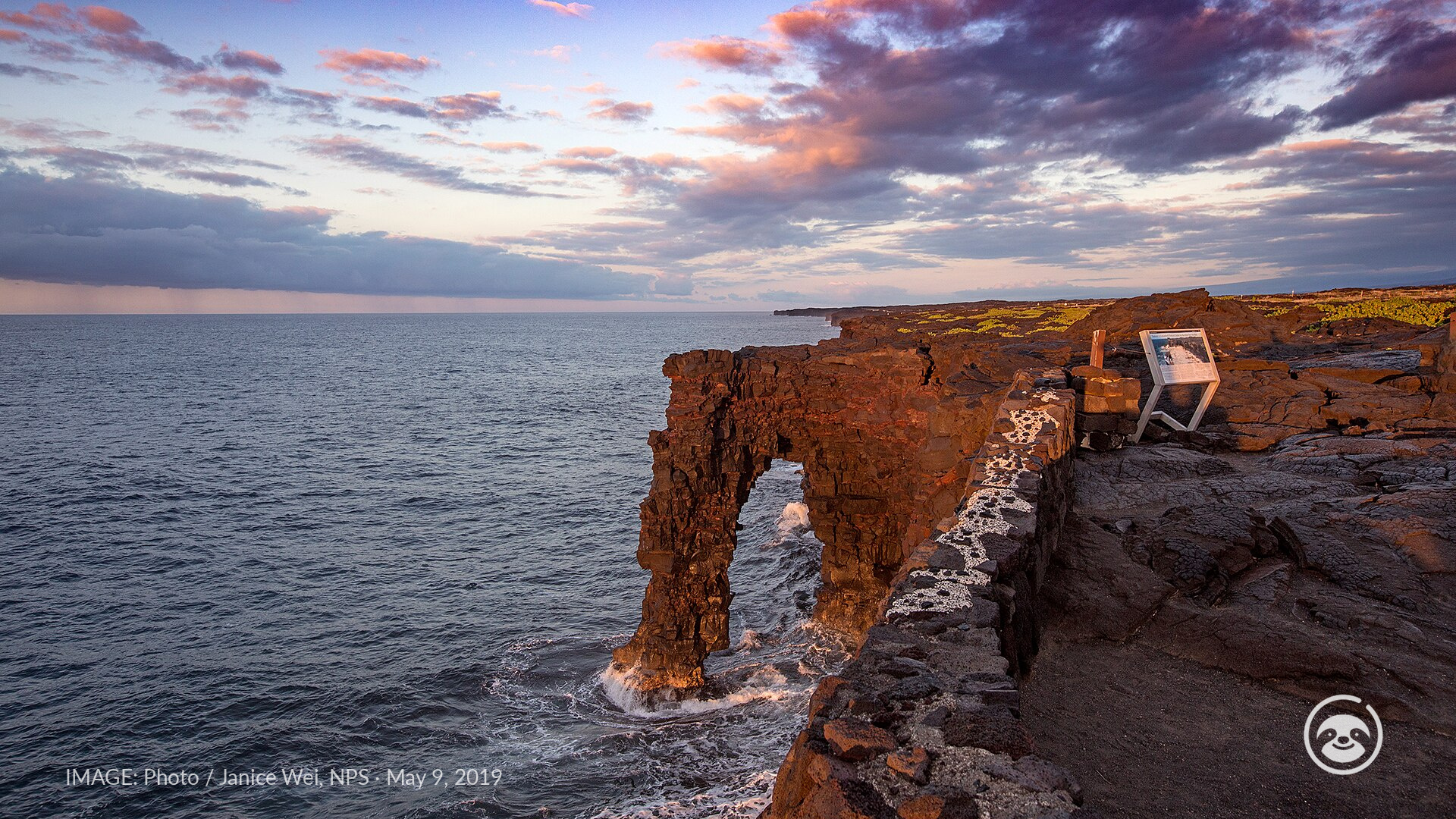 Hōlei Sea Arch and its supporting pillar above the Pacific at sunrise in May 2019, before the collapse.